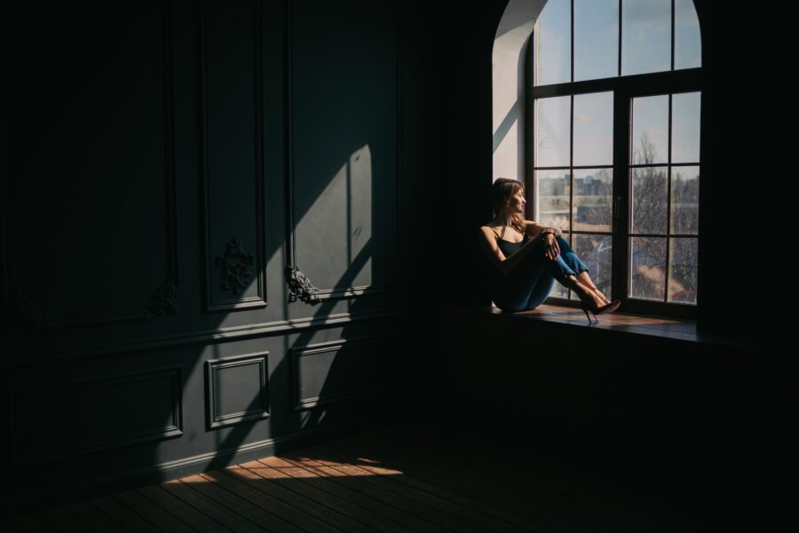 Woman sitting alone by a sunlit window, reflecting — sermon on what God requires, Trinity Baptist Church Cayce SC