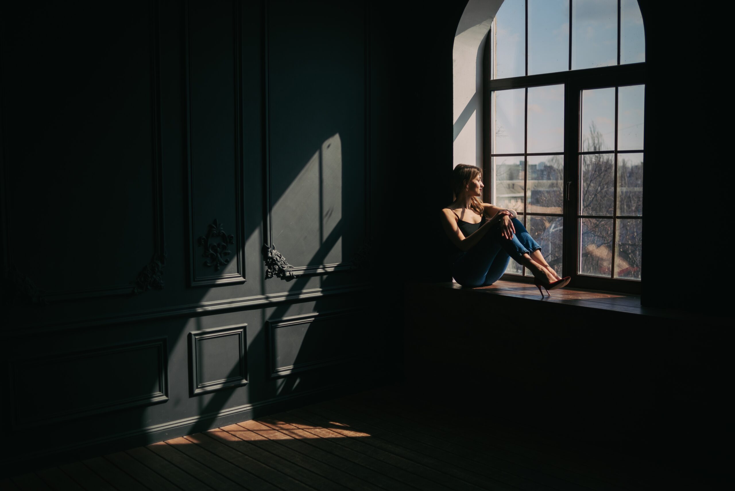 Woman sitting alone by a sunlit window, reflecting — sermon on what God requires, Trinity Baptist Church Cayce SC